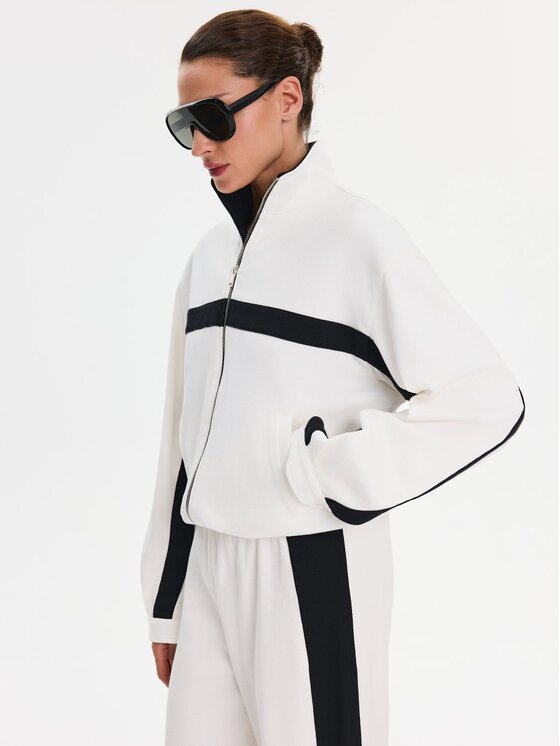 Nudyess Nudyess Spodnie materiałowe Mica z prążka Kremowy Relaxed Fit