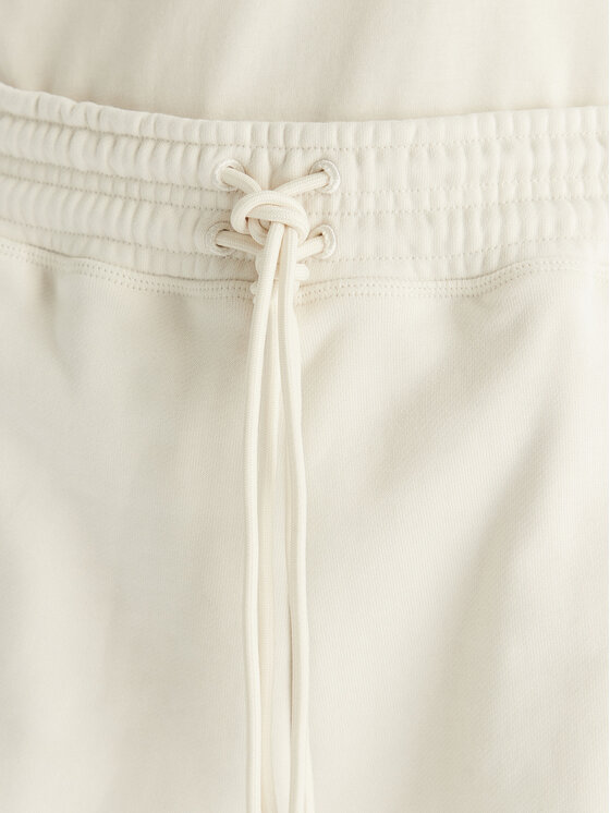 adidas by Stella McCartney adidas by Stella McCartney Szorty sportowe True Casuals JX6786 Beżowy Loose Fit