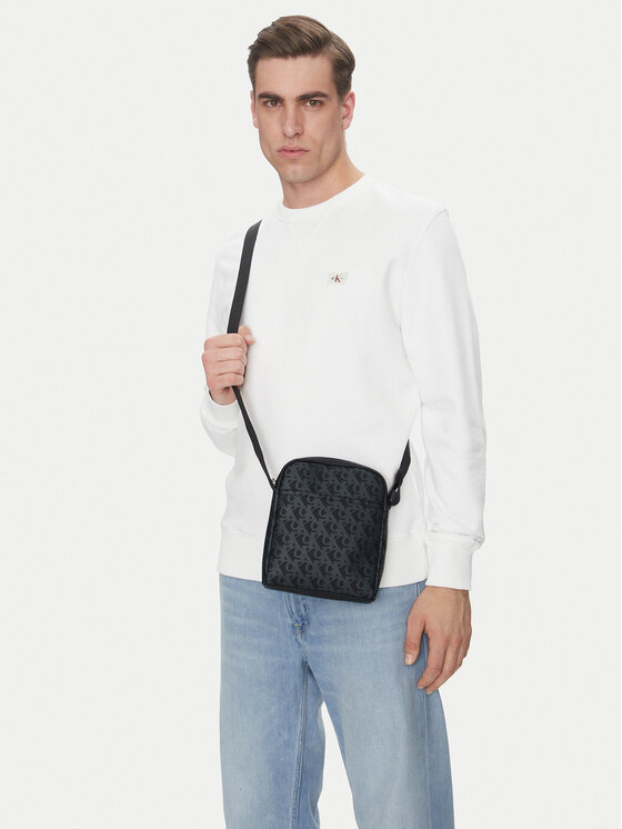 Calvin Klein Jeans Calvin Klein Jeans Crossover torbica Matte Aop Reporter 18 LV04G3115G Crna