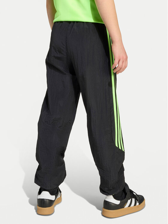 adidas adidas Spodnji del trenirke Teamgeist JY6321 Črna Loose Fit