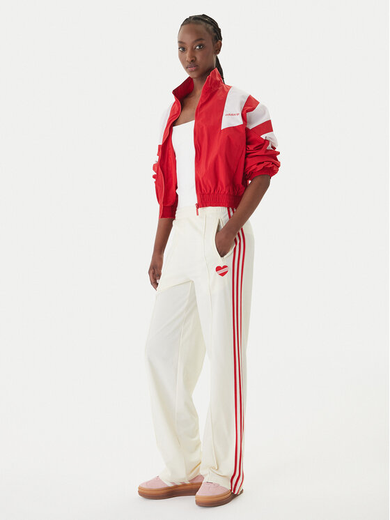 adidas adidas Spodnie dresowe Firebird KQ8056 Beżowy Loose Fit