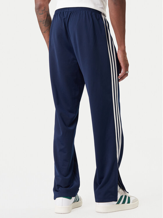 adidas adidas Teplákové nohavice Firebird KD8316 Tmavomodrá Loose Fit