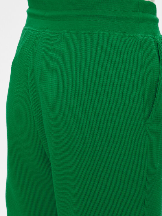 Tommy Hilfiger Tommy Hilfiger Spodnie dresowe UW0UW04946 Zielony Relaxed Fit