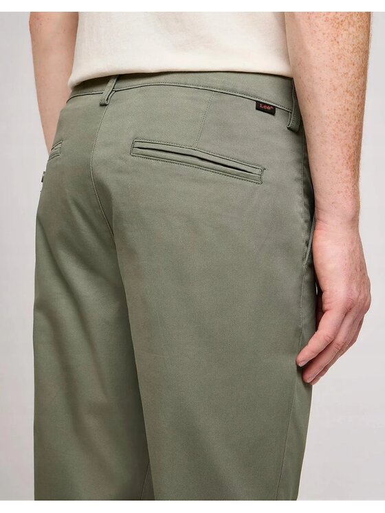 Lee Lee Spodnie materiałowe SLIM CHINO Zielony Loose Fit