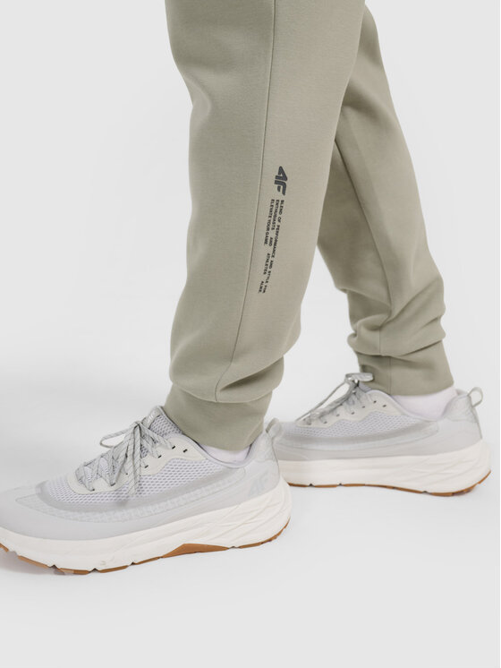 4F 4F Spodnie dresowe SIMPLE UTILITY Turkusowy Regular Fit