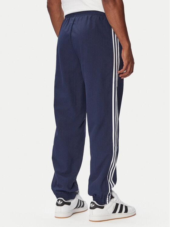 adidas adidas Долнище анцуг Firebird Woven KE1370 Тъмносин Regular Fit