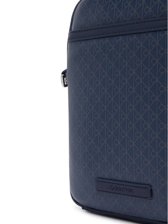 Calvin Klein Calvin Klein Maža rankinė Emblem Aop Coated Slim Reporter LV04D3334G Tamsiai mėlyna