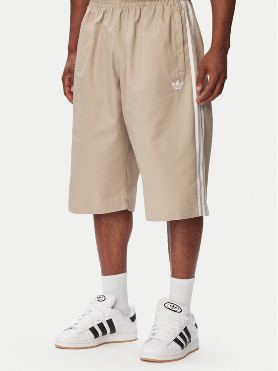 adidas adidas Pantaloni scurți sport Adicolor Twill KR1388 Bej Relaxed Fit