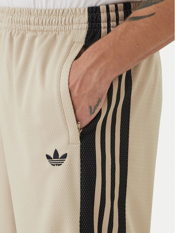 adidas adidas Spodnie dresowe KE0116 Beżowy Loose Fit