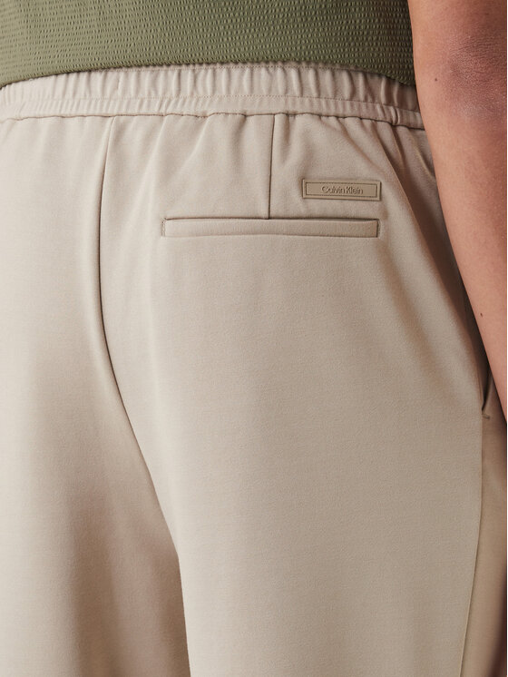 Calvin Klein Calvin Klein Bavlnené nohavice LV04LF607G Béžová Tapered Fit