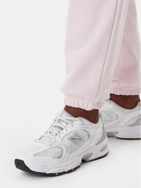 New Balance New Balance Teplákové kalhoty Essentials WP41500 Růžová Relaxed Fit