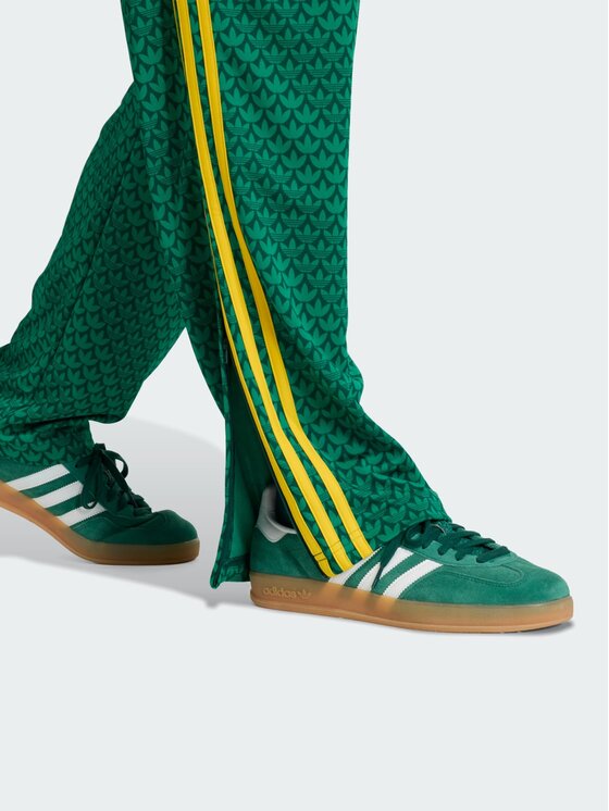adidas adidas Spodnie dresowe Firebird loose monogram Zielony ciemny Regular Fit