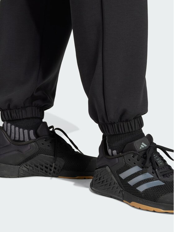 adidas adidas Spodnie materiałowe 141075 Czarny Loose Fit