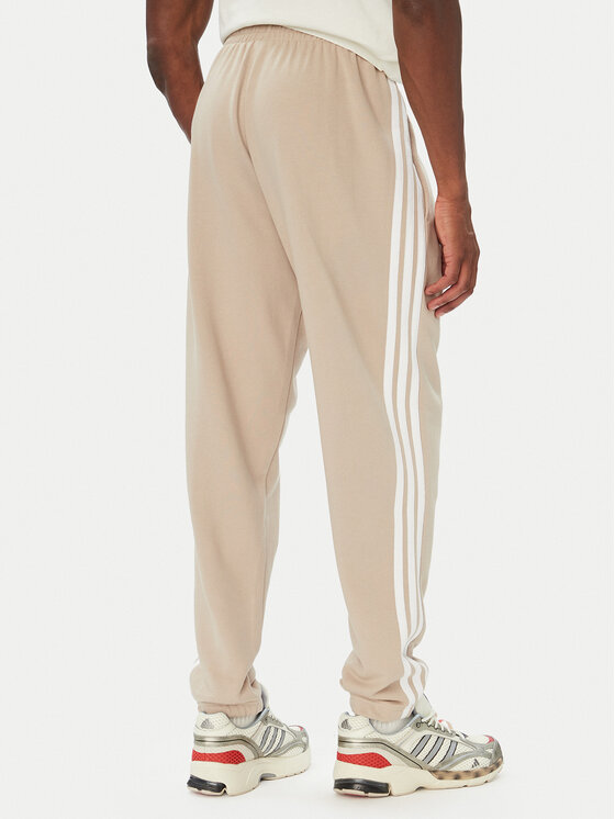 adidas adidas Παντελόνι φόρμας Essentials 3-Stripes French Terry Tapered Cuffed KY4196 Μπεζ Regular Fit