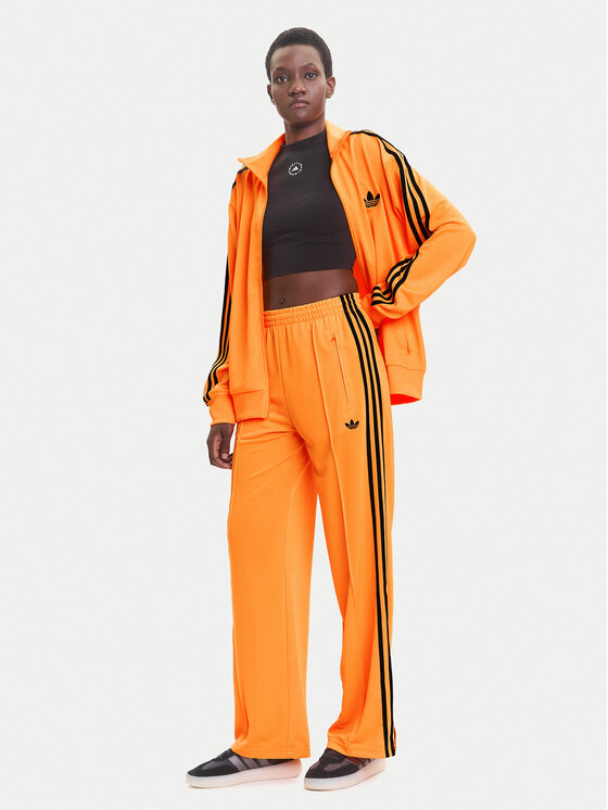 adidas adidas Долнище анцуг adicolor Classic Firebird JY2694 Жълт Loose Fit