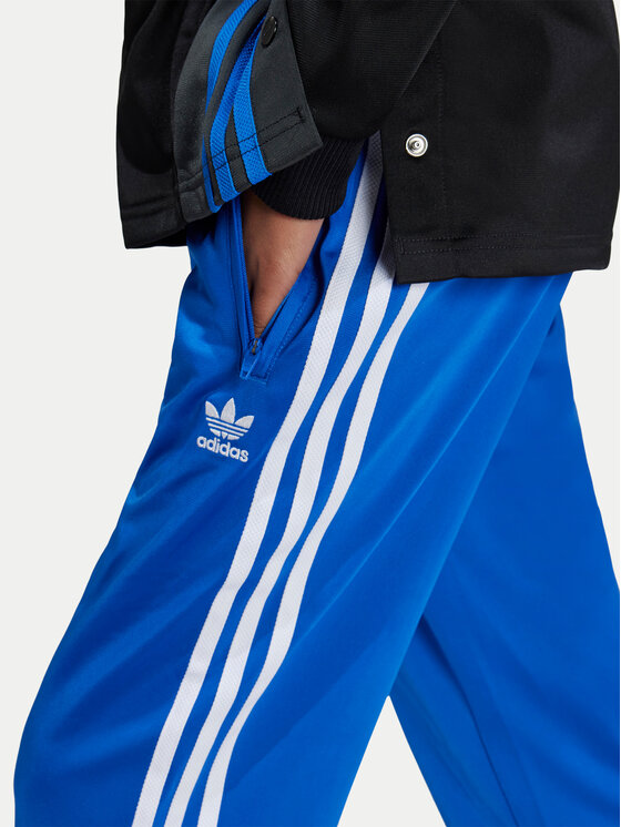 adidas adidas Donji dio trenerke Firebird IY9803 Plava Regular Fit