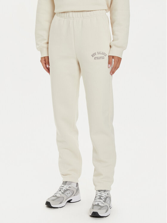 New Balance Teplákové nohavice WP43500 Béžová Relaxed Fit
