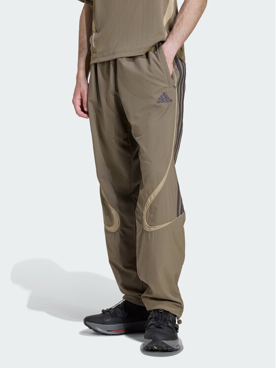 adidas adidas Spodnie materiałowe 152583 Brązowy Loose Fit