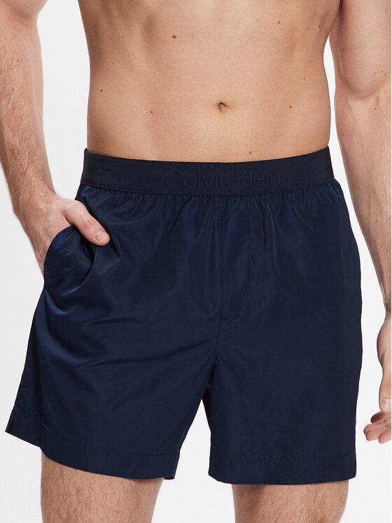 Calvin Klein Swimwear Kopalne hlače Medium Waistband KM0KM00862 Mornarsko modra Regular Fit