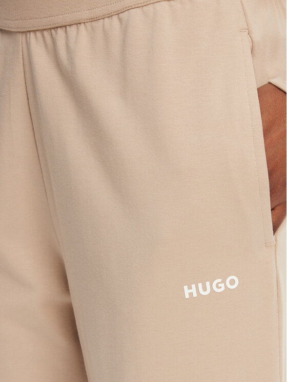 HUGO HUGO Spodnie dresowe 50490578 Beżowy Regular Fit