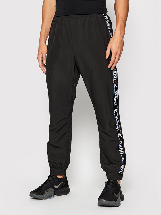 Karl Kani Sportinės kelnės Og Tape 6006127 Juoda Regular Fit • Modivo.lt