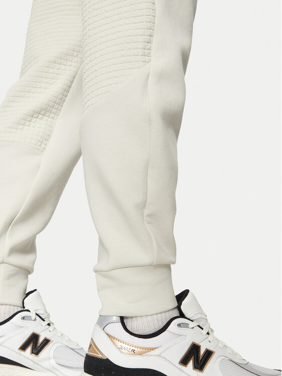 Under Armour Under Armour Spodnji del trenirke UA Unstoppable 1386544 Écru Regular Fit