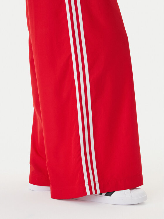 adidas adidas Спортивні штани Firebird Adilenium KD6299 Червоний Regular Fit