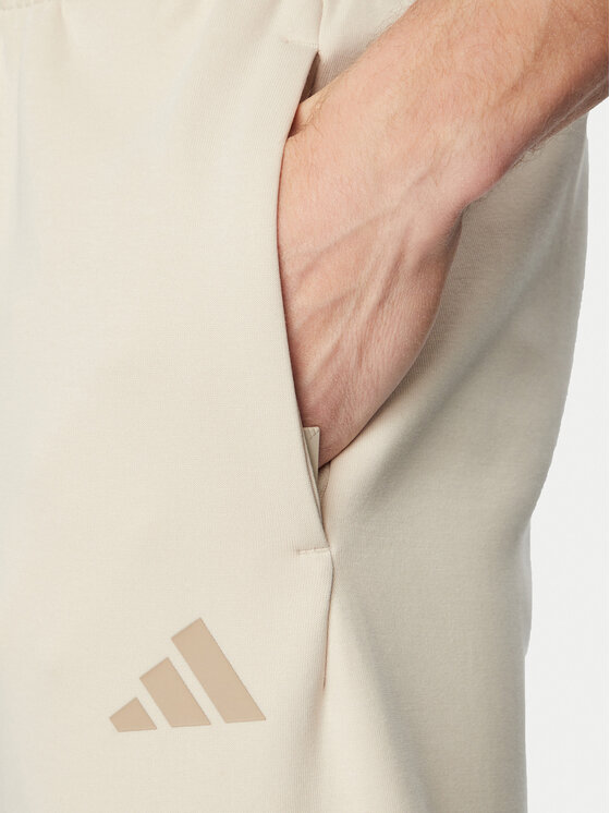 adidas adidas Pantaloni da tuta Future Icons 3-Stripes KD5206 Beige Regular Fit