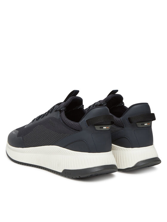 Buty sportowe widziane pod kątem od tyłu, widoczne zapiętki.