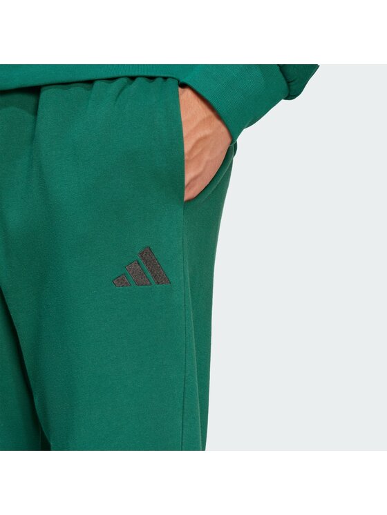adidas adidas Spodnji del trenirke Essentials Feel Cozy JE3858 Zelena Regular Fit