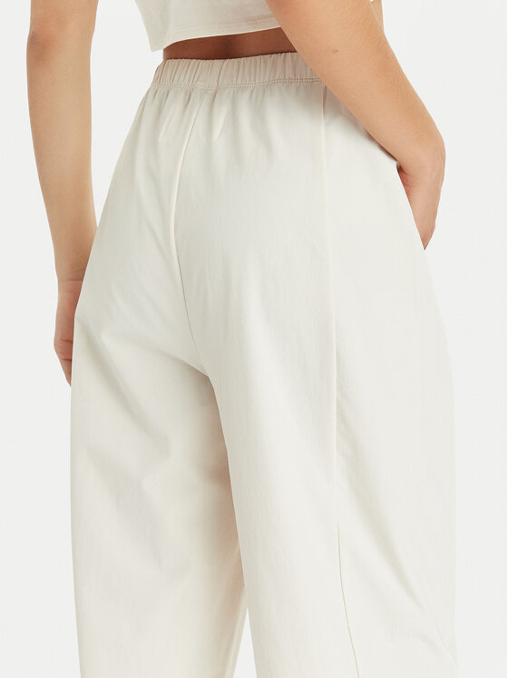 Champion Champion Pantaloni di tessuto 117110 Beige Relaxed Fit