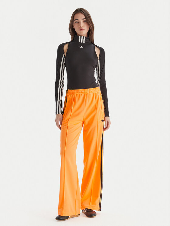 adidas adidas Teplákové kalhoty adicolor Classic Firebird JY2694 Žlutá Loose Fit