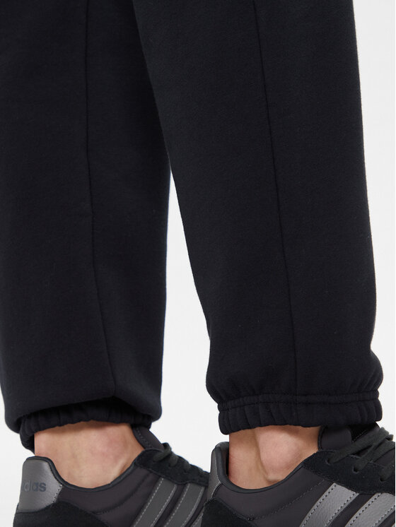 Under Armour Under Armour Teplákové nohavice Ua Icon 6003676 Čierna Loose Fit