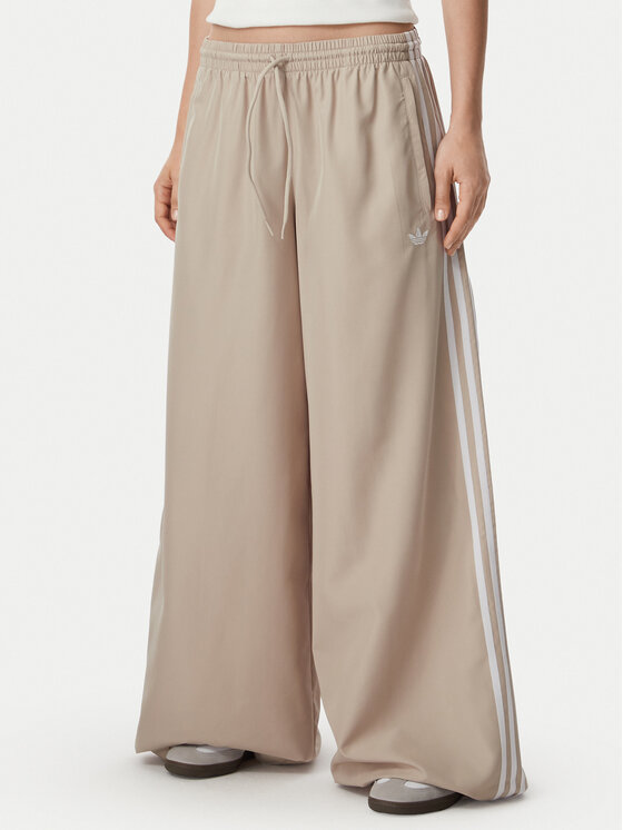 adidas Pantaloni trening Firebrid Adilenium Track KT0019 Bej Relaxed Fit
