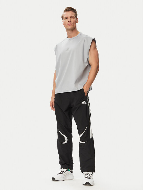 adidas adidas Παντελόνι φόρμας adicolor Teamgeist KD5863 Μαύρο Loose Fit