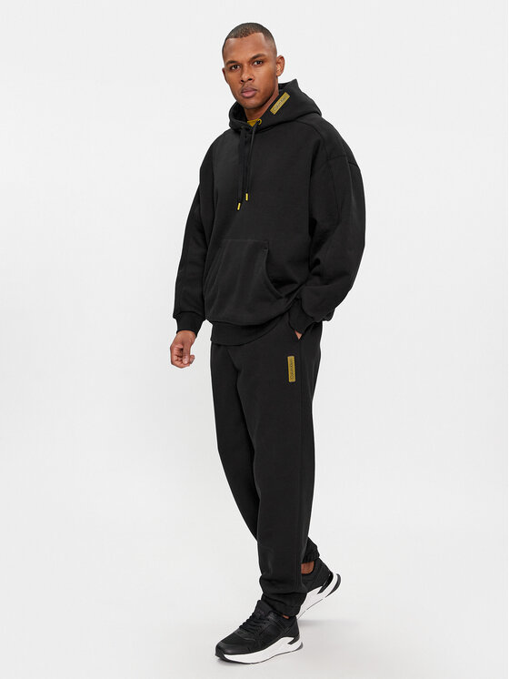 Calvin Klein Calvin Klein Donji dio trenerke Grid Logo K10K112430 Crna Relaxed Fit