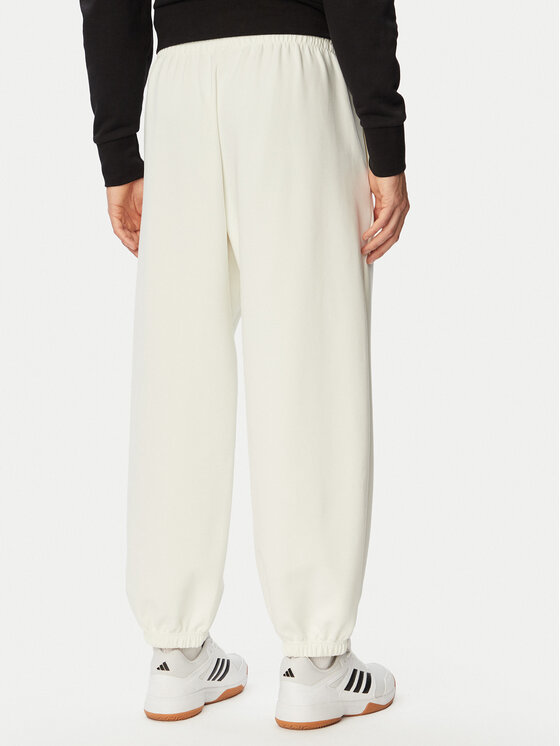 adidas adidas Donji dio trenerke Soft Lux KF8574 Krem Regular Fit