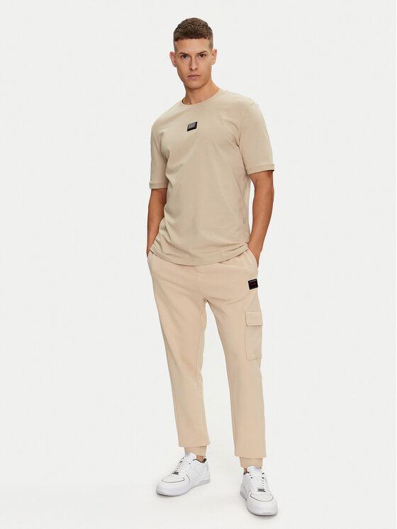 HUGO Hugo Spodnie dresowe Dwellrom_Gel 50528176 Beżowy Relaxed Fit