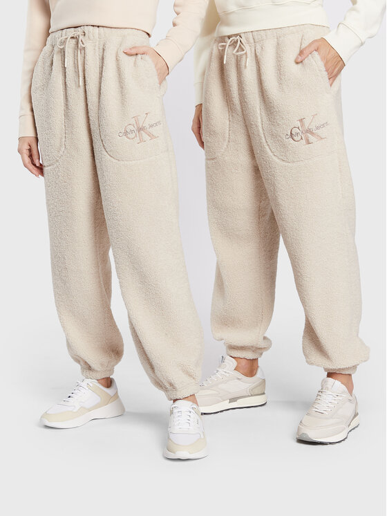 Calvin Klein Jeans Calvin Klein Jeans Bavlnené nohavice Unisex J40J400187 Béžová Regular Fit