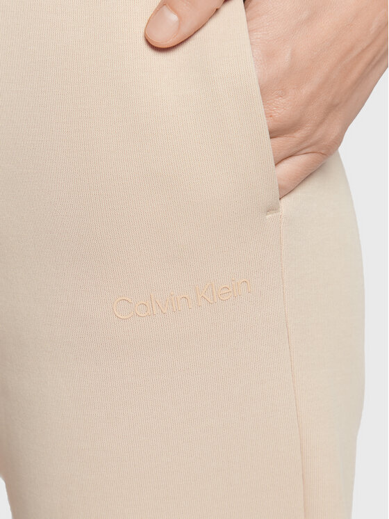 Calvin Klein Calvin Klein Spodnie dresowe Micro Logo Essential K20K204424 Beżowy Regular Fit