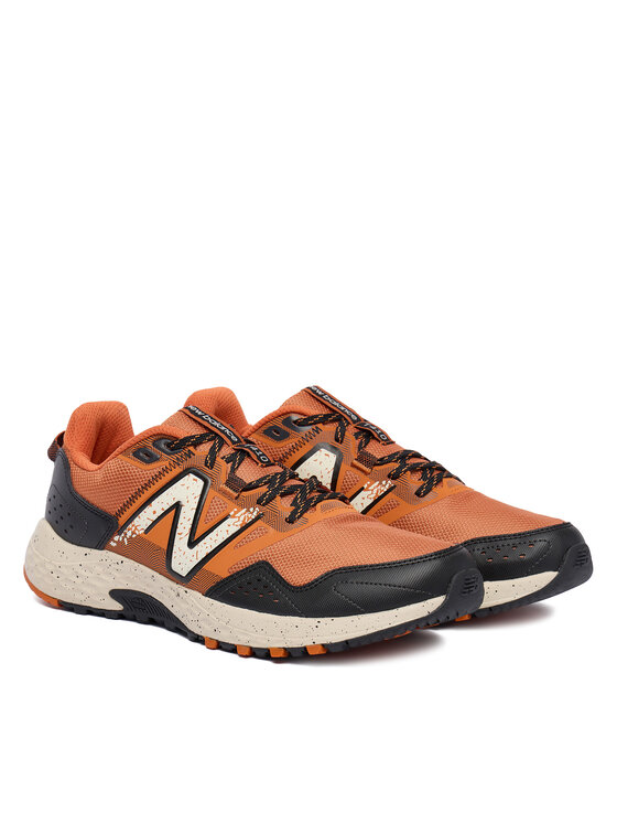 New Balance New Balance Buty do biegania T410 MT410OR8 Brązowy