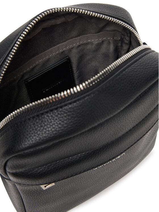 Calvin Klein Calvin Klein Crossover torbica Raised Reporter LV04D3160G Crna