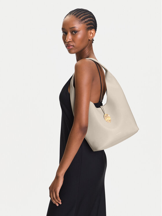 Calvin Klein Jeans Calvin Klein Jeans Handtasche Stone Lock Slouchy Small Shoulde LV04K3176G Creme