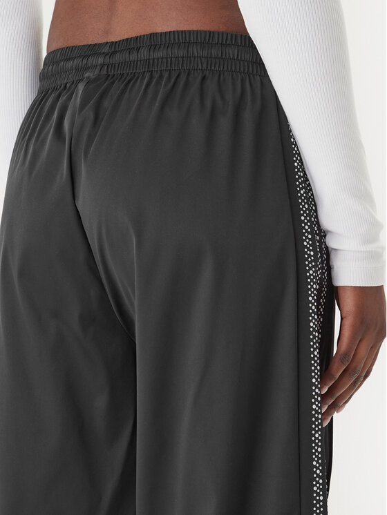 adidas adidas Pantaloni da tuta Pearl Firebird KC7863 Nero Loose Fit