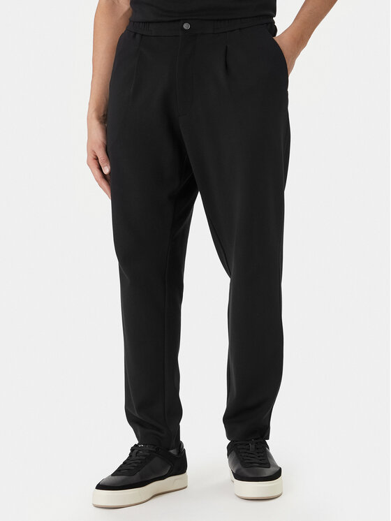 Calvin Klein Pantaloni din material LV04LF607G Negru Tapered Fit