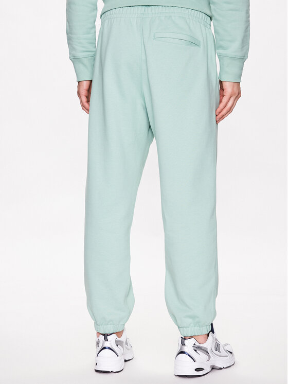 New Balance New Balance Spodnie dresowe MP23551 Zielony Relaxed Fit