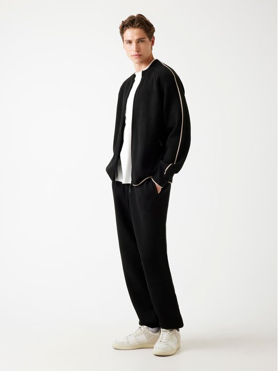 Guess Guess Spodnie materiałowe 179300 Czarny Regular Fit
