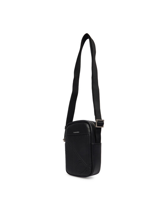 Calvin Klein Calvin Klein Ľadvinka Emblem Aop Emboss Slim Reporter LV04D3371G Čierna