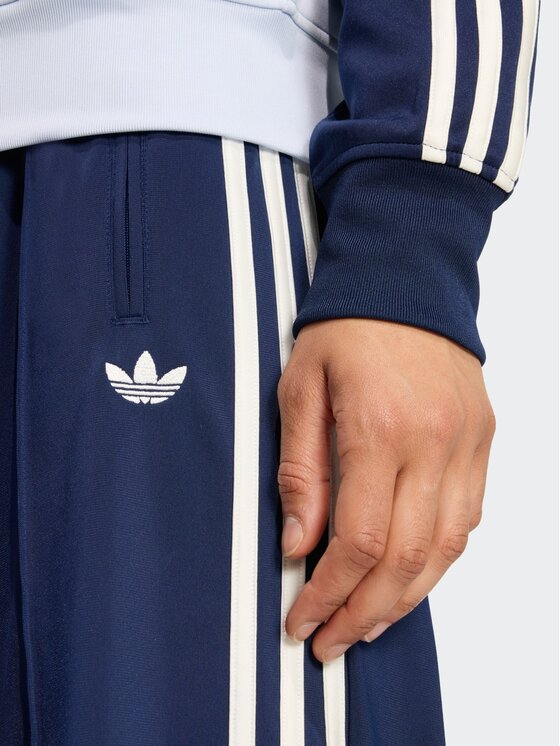 adidas adidas Spodnie dresowe Firebird Błękitny Loose Fit