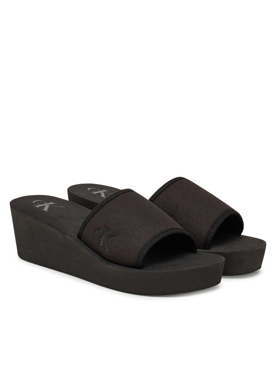 Calvin Klein Jeans Calvin Klein Jeans Шльопанці Beach Wedge Slide Canvas YW0YW01725 Чорний